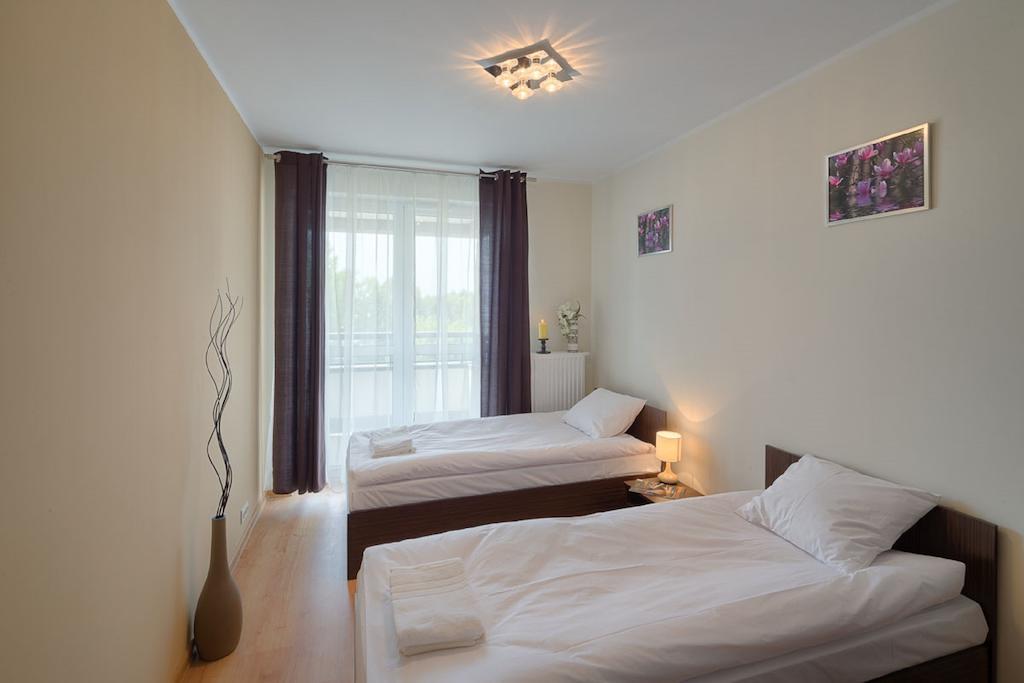 City Aparthotel Ochota Varsovia Habitación foto